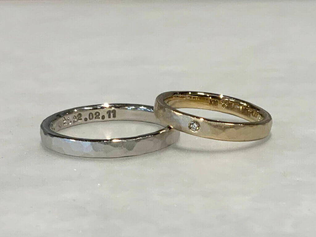 Handmade wedding band in platinum and champagne gold, hammered and blasted