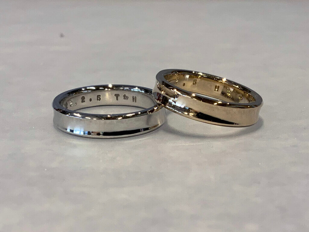 Handmade wedding band with curves like gentle waves