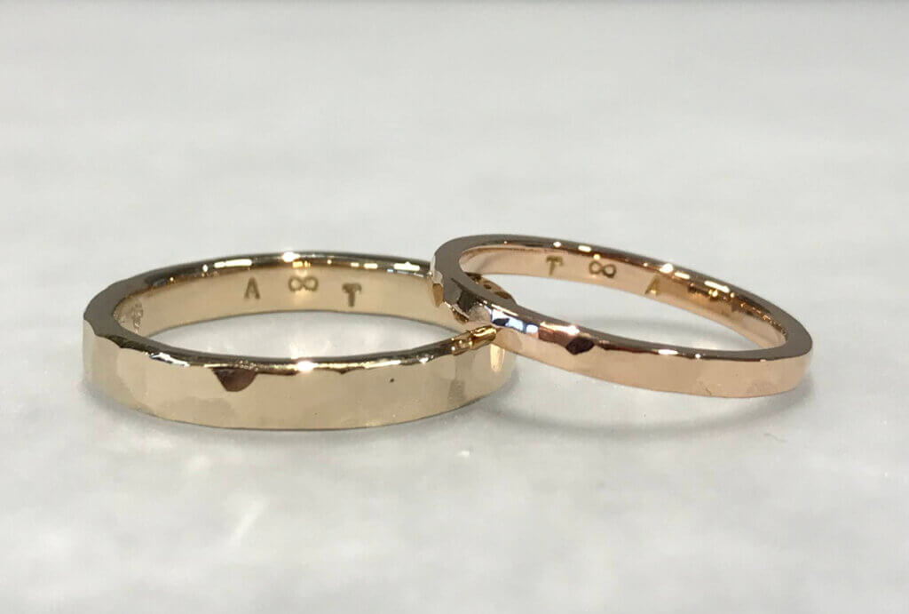 Colored gold hammered handmade wedding rings made in the width of each other's choice.