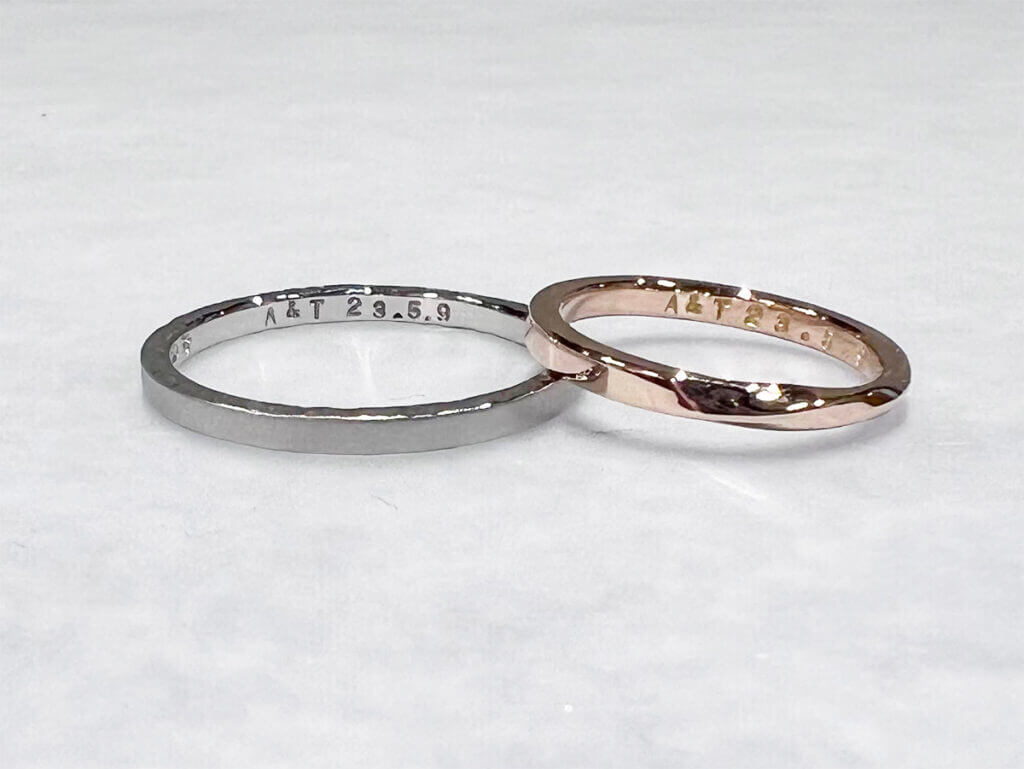 Pair of pink gold twisted rings with side textures